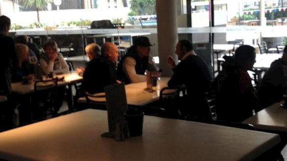 Fancy meeting you here: Israel Folau, wearing hat, in an old photo with his manager Isaac Moses, who is in dispute with Joe Wehbe over their management company.