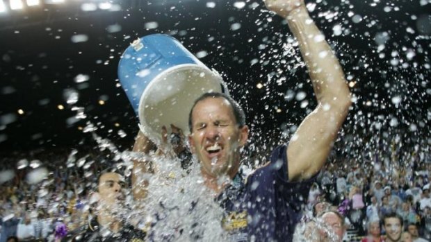 Brian Goorjian gets a soaking as  his Sydney Kings celebrate their third successive NBL championship in 2005.