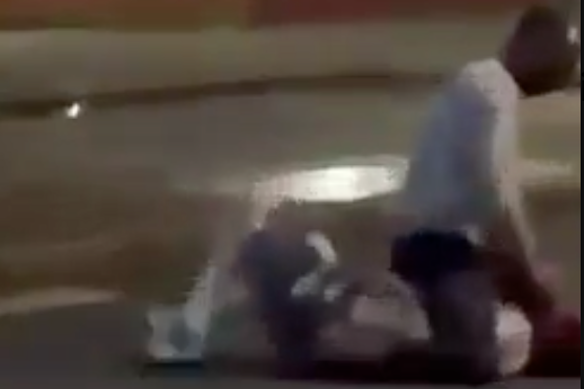 Warning graphic content: An online video showed the assailant kneeling over the victim.