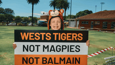 ‘Give power back to the fans’: Hundreds rally against Wests Tigers owners