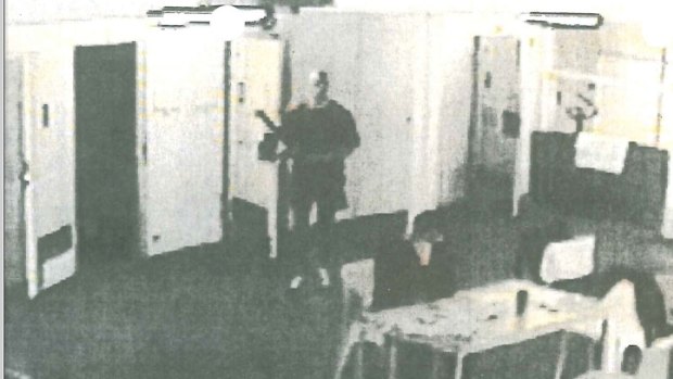 Still from CCTV footage moments before Matthew Johnson killed Carl Williams in Barwon Prison. Tommy Ivanovic was in the room facing away from the murder. He did not turn around despite the noise the attack would have made.