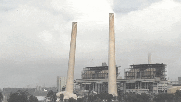 The Liddell Power Station chimney stacks being demolished today.