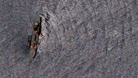 The partially sunk Iranian navy vessel Kharg in the Gulf of Oman.