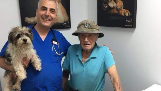 Bob with his dog Peppe, who is missing after the house fire, and vet Dr Ahmed.