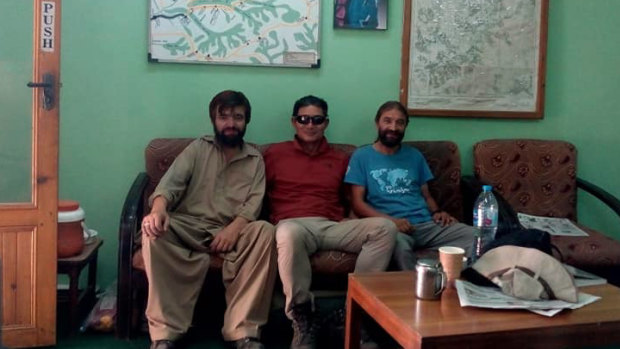 "He has climbed all 14 eight-thousanders without oxygen": Kim Chang-ho, centre, in Pakistan for a talk in August.