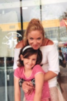 Missing woman Tina Greer with daughter Lili.