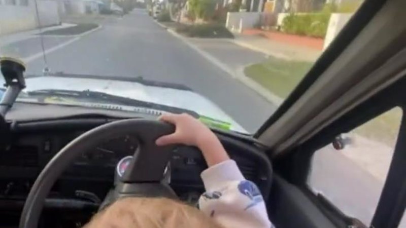 ‘There’s no defence’: Man arrested over video of three-year-old steering car