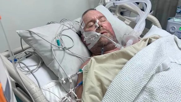 Perth father Paul Dougan has been hospitalised in Bali after allegedly being assaulted by fellow Australians while on holiday.