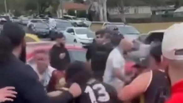 Players from the Berala Bears and Lalor Park Kookas fighting in the carpark of the Terry Lamb Complex in Chester Hill.