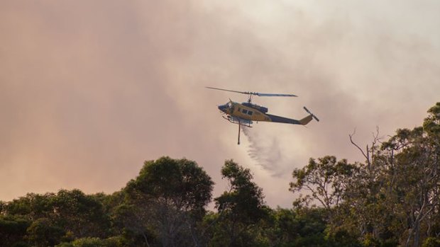 firefighting efforts near Meridan Plains in Caloundra on Tuesday.