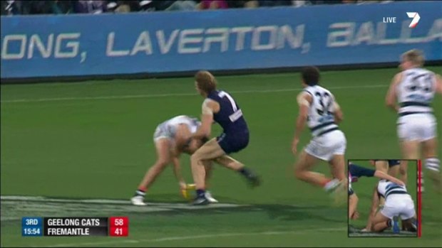 Nat Fyfe collides with Geelong’s Andrew Mackie.