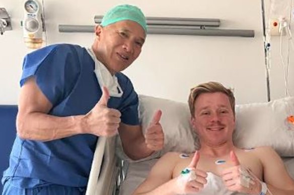 Billy Baldwin with Charlie Teo after having a tumour removed from his lower back in the Hospital Universitario Fundacion Jimenez Diaz in Madrid, Spain.