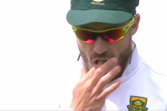 Faf du Plessis shining the ball with a lolly in 2016.