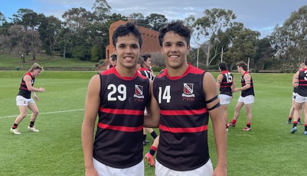 Jayden Davey (left) and twin brother Alwyn jnr in their Xavier College jerseys at Scotch College.