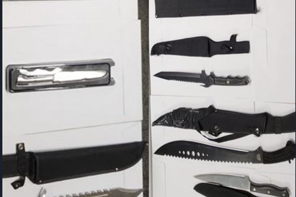 Police allegedly seized a number of knives at the popular harbour beach on Monday afternoon. 