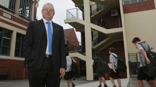 Principal of Christian Brothers College, St. Kilda, Gerald Bain-King in his school yard today.12