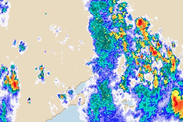 BOM's rain radar shows heavy rain north-east of Melbourne.