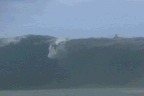 Slater overcame the huge swell to beat Gabriel Medina. 