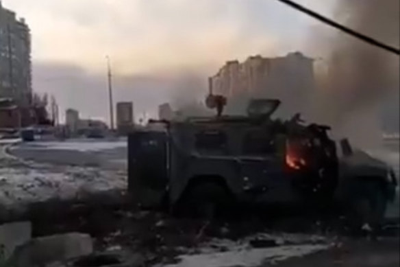 A burning vehicle in Kharkiv on Sunday.