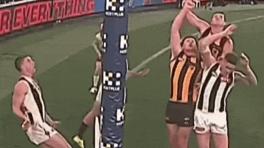 Collingwood’s Sam Swadling punches the post-siren kick from Dylan Moore into the field of play, ensuring Saturday night’s match at the MCG ended in a draw.
