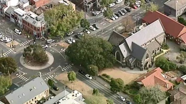 Police have arrested a man near St Mary's church in North Melbourne