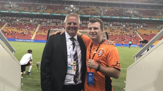 Mark Kingsman with Queensland boxer Jeff Horn at a Brisbane Roar game two years ago.