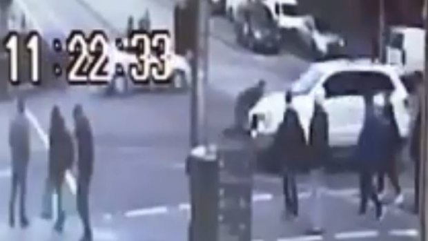 The man clung to the bonnet of the Jeep for hundreds of metres through Melbourne's CBD