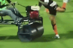 Andros Townsend sent to the ground and rolled over. 
