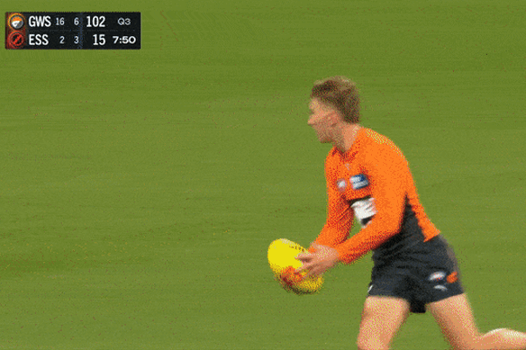 Giant Harry Himmelberg takes the handball receive and boots a goal in the massive win over Essendon.