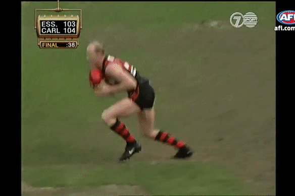 Fraser Brown tackles Dean Wallis in the dying stages of the 1999 preliminary final.