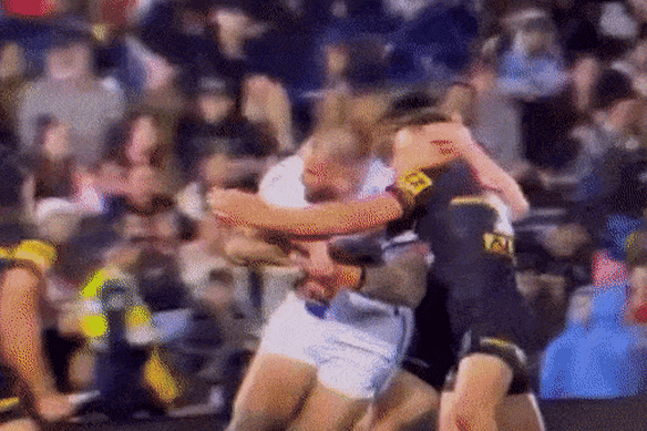 Jarome Luai collects Nelson Asofa-Solomona high.