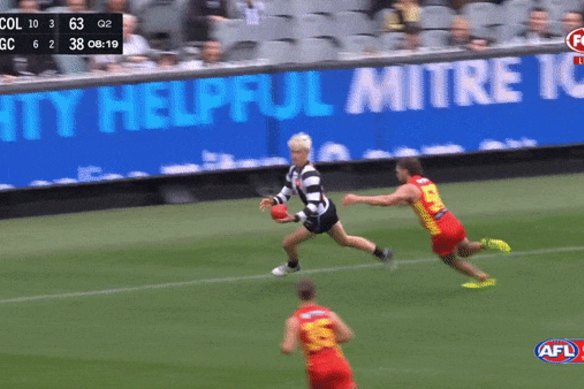 Jack Ginnivan kicks a goal of the year contender.