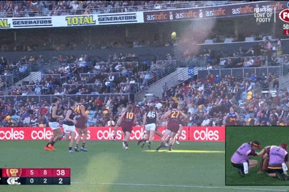 Patrick Cripps bumps Callum Ah Chee.