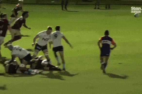 Max Jorgensen darts through the Queensland defence to score for NSW.
