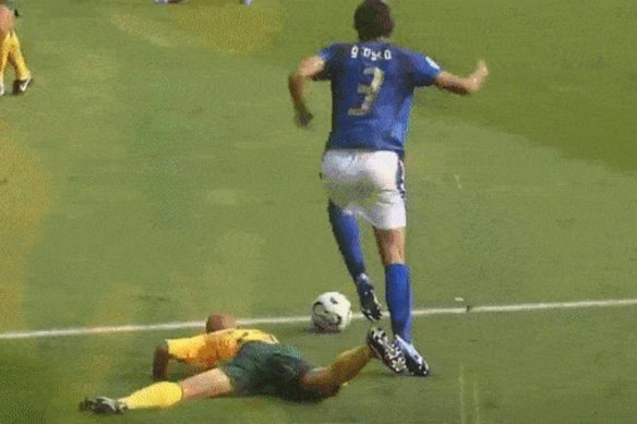 Fabio Grosso was awarded a penalty for this Lucas Neill tackle.