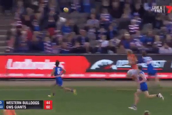 Toby Greene leads with his foot against then Bulldog Luke Dahlhaus.