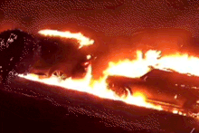 The cars quickly became engulfed in flames.
