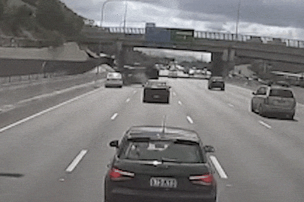 An SUV is sent flying into the air by another car on the Pacific Motorway at Eight Mile Plains.