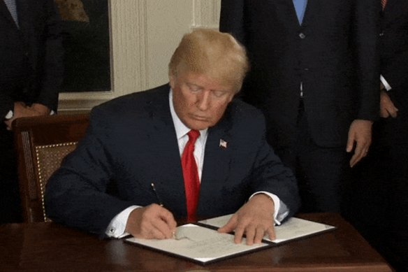 US president Donald Trump signing a memorandum targeting China’s economic aggression, on Thursday, March 22, 2018. 