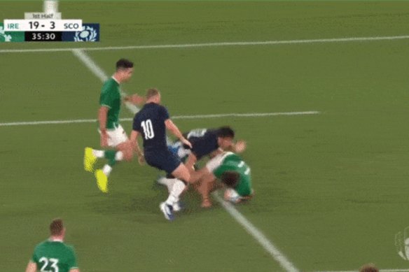 Scotland players successfully manage a counter-ruck.