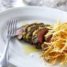 Steak frites with Cafe de Paris butter and pommes allumettes.