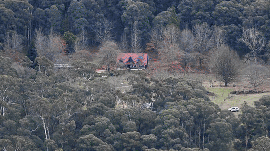 Police were at the property to execute a warrant for historical sex abuse allegations when the two officers were shot dead in an ambush and another wounded.