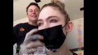 Elon Musk joins an Instagram livestream by his musician girlfriend, Grimes, in mask, at their home.