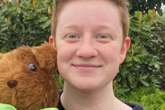 Transgender student Miles Wade with a teddy bear he made for the Magical Getaway Foundation, which sends disadvantaged children on family holidays.
