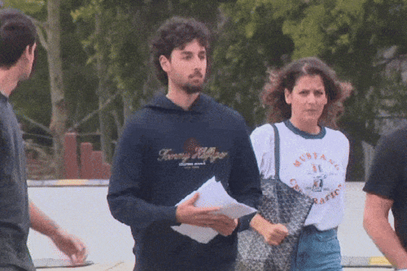 Papazoglu, centre, leaving Silverwater prison after being released on bail.