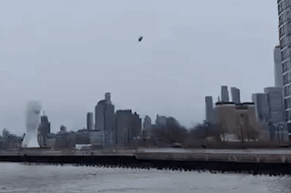 Video footage shows a helicopter plummeting into the Hudson River.