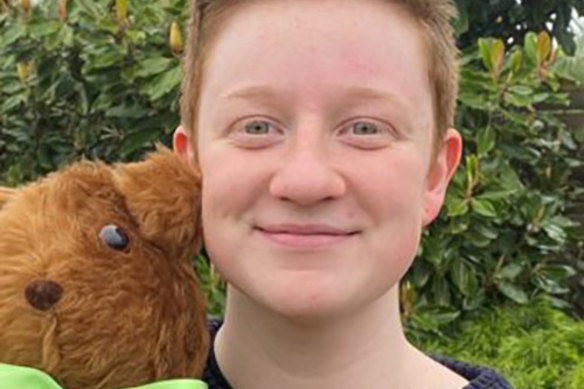 Transgender student Miles Wade with a teddy bear he made for the Magical Getaway Foundation, which sends disadvantaged children on family holidays.
