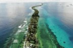 Tuvalu is being swallowed by the ocean. Its people face a difficult choice