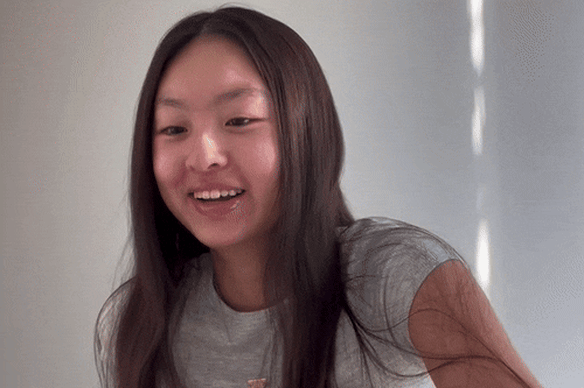Stacy Zhang receives her HSC results (an ATAR of 99.95) last year. 
