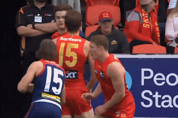 Gut punches, such as these examples from 2025 by Melbourne’s Kysaiah Pickett and St Kilda’s Mitch Owens, will incur a one-match suspension in 2026.